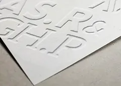 Embossed detail on a printed carton